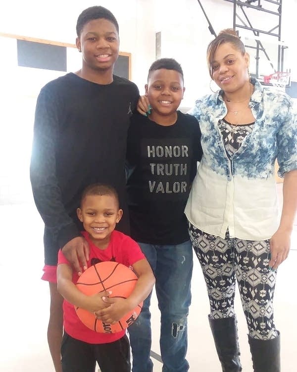 Shaquonna Jackson and her three sons earlier this year. 