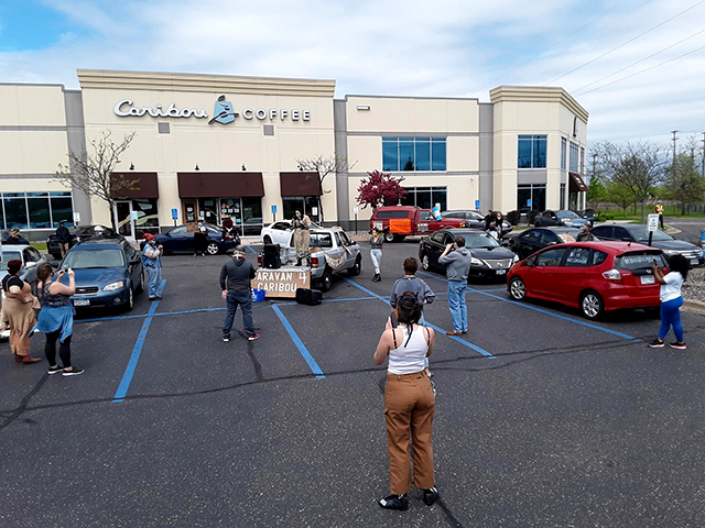 Caribou Coffee workers carry out a socially-distanced rally in Edina, asking for better benefits amid COVID-19.