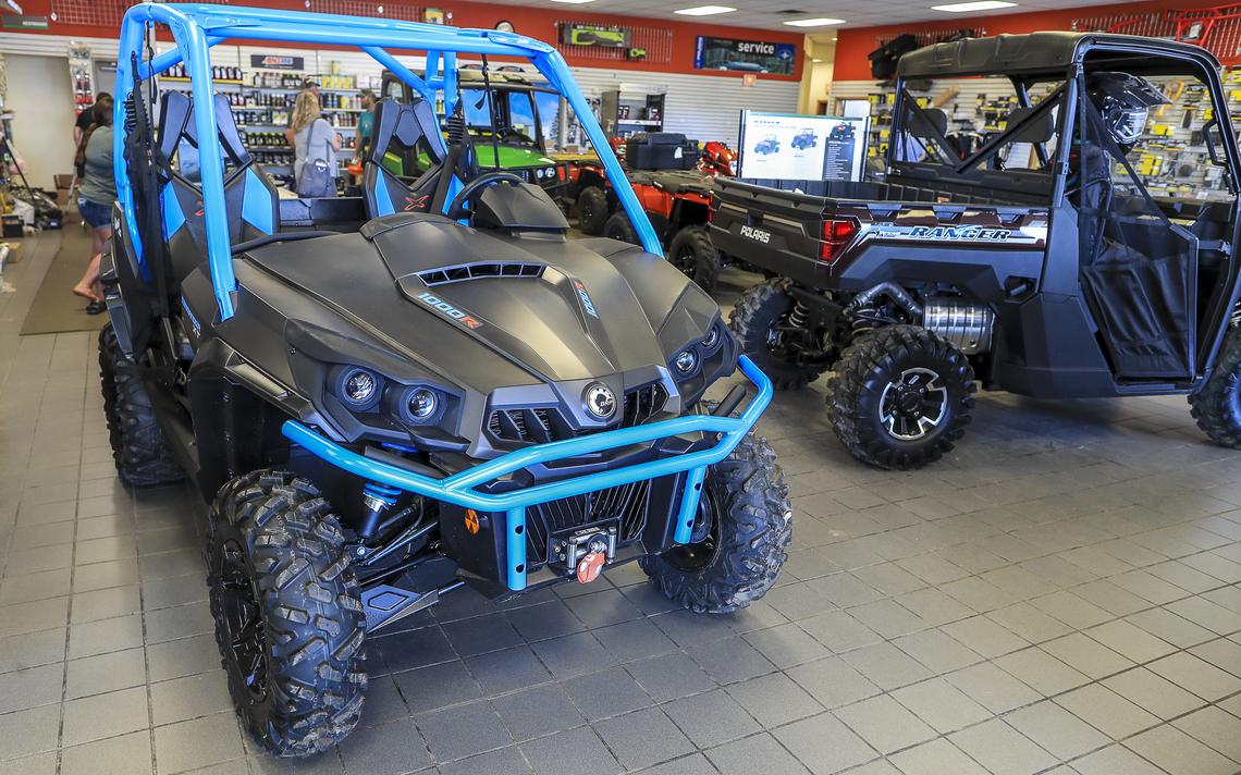 A few of the side-by-side ATVs for sale at Duluth Lawn & Sport seen Thursday afternoon. (Clint Austin / caustin@duluthnews.com) 