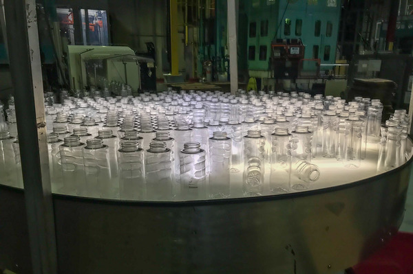 New plastic bottles come off the line at a plastic manufacturing facility in Maryland. Plastic production is expected to triple by 2050.