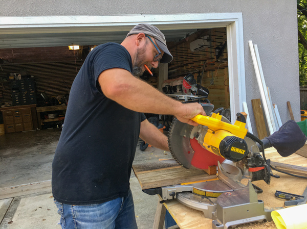 John Buhr now devotes much of his time to fixing up his family's home in Kansas City. He's building a playhouse for his young children, an apartment for the grandparents to use on their extended babysitting visits and an office for his wife, who supports the family working in the tech industry.