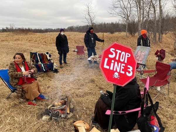 About 20 people gathered for a small protest against the Line 3 project.