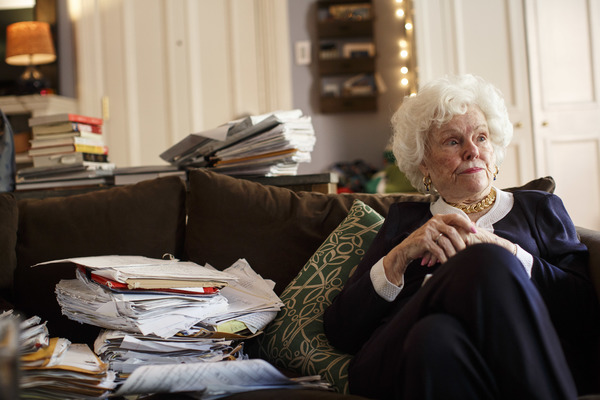 Doris Buffett, the late sister of Warren Buffett, sits with some of the letters Buffett received asking for help, and which inspired a foundation, in Boston on Aug. 2, 2016. The Letters Foundation, as it's known, applied for PPP funding and received nearly $270,000.
