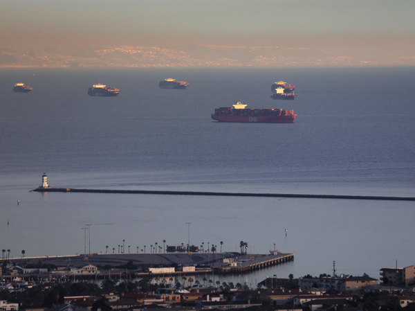 Container ships and tankers are anchored close to the ports of Los Angeles and Long Beach on Feb. 1 in San Pedro, Calif. The Port of Los Angeles logged its busiest month in history in May.