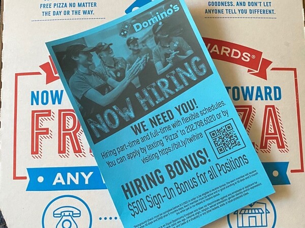 In need of workers, a Domino's franchise in Washington, D.C., is offering a sign-on bonus for all positions.