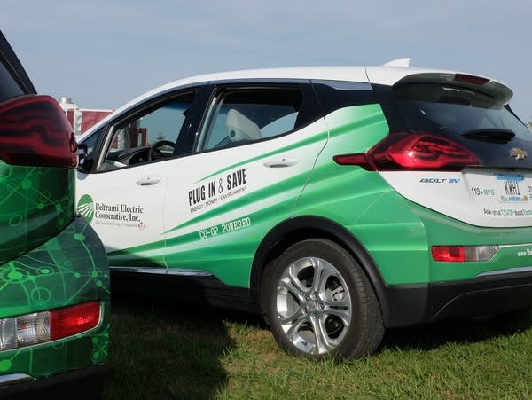 cars painted to promote electric vehicles