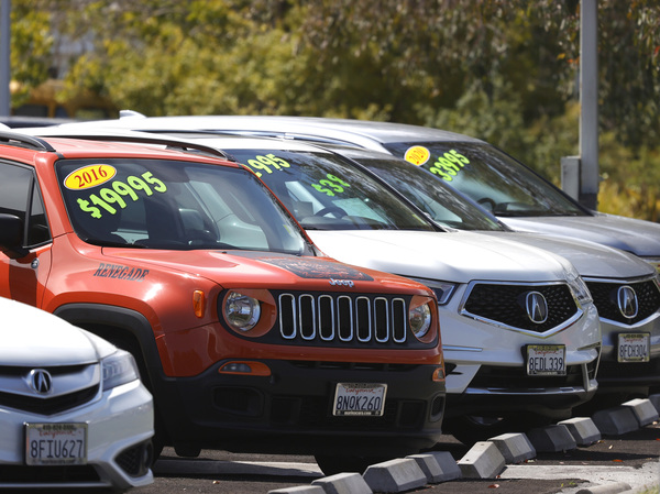 Used cars are displayed on the sales lot of a dealier in Corte Madera, Calif., on July 13. Used car prices have surged during the pandemic as many Americans have splurged on big-ticket items.