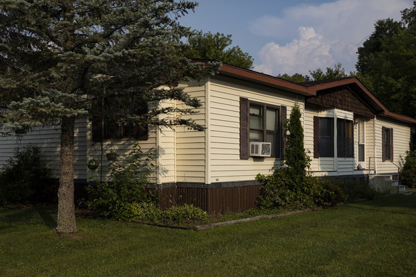 Mary Hunt's home in Swartz Creek, Mich., on Aug. 4. Havenpark Communities, her new landlord, started raising her rent and tacking on new fees. In the beginning of the year Hunt fell behind on rent, and was sued for eviction.