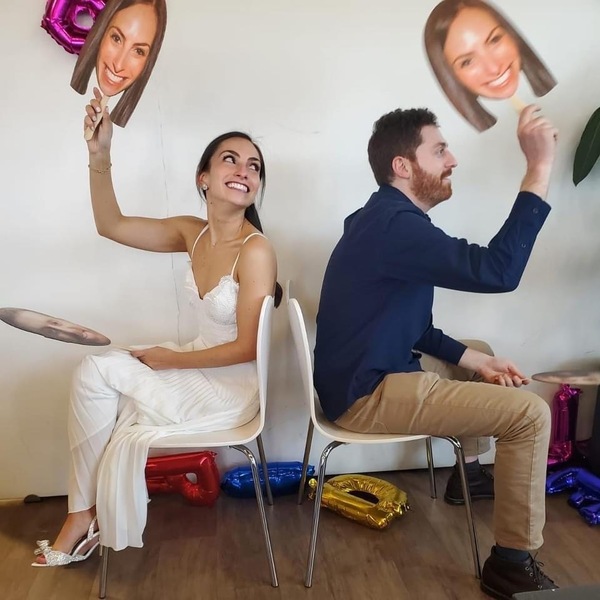 Jenna Mantis celebrates at her bridal shower with her fiancé Sam Cutler, in advance of their April wedding. As COVID-19 cases are ticking back up, and state restrictions are lifting, they are imposing their own rules, asking guests to send proof of vaccinations and negative PCR tests.