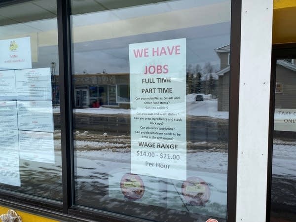 A sign in a window reads "We have jobs. Full Time. Part Time"