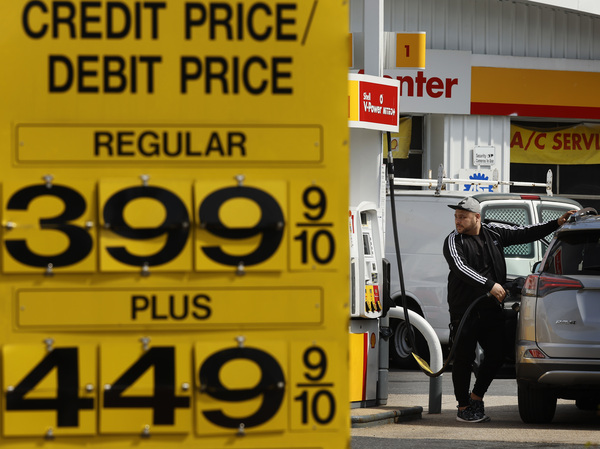 Gasoline prices hover around $4 a gallon for the least expensive grade at several gas stations in Washington, D.C., on April 11.