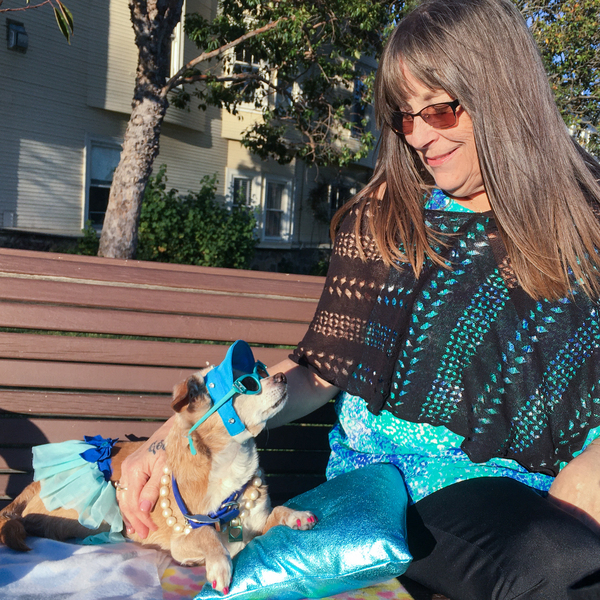 Diana McAllister takes her dog, Honey, to a park in San Francisco, where some owners have had to wait months to get veterinarian appointments.