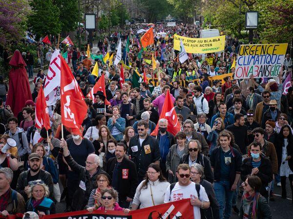 Protesters march during the annual May Day rally, marking International Workers' Day, in Paris on Sunday.