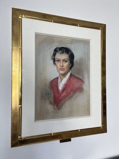 A photo of a woman in a frame