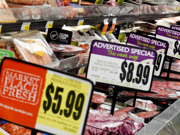 Beef is advertised for sale in a grocery store in Los Angeles, Calif., on Sept. 13, 2022. Grocery prices, overall, are still high, and that continues to puta strain on many household budgets.