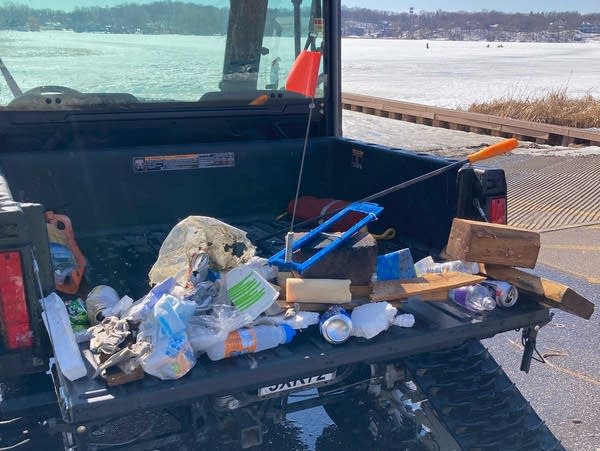 Trash collected on a frozen lake