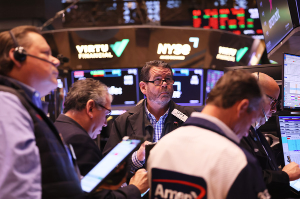 Traders on the floor of the New York Stock Exchange on Monday. Bank stocks, especially for regional banks, slumped after the takeover of SVB and Signature Bank.