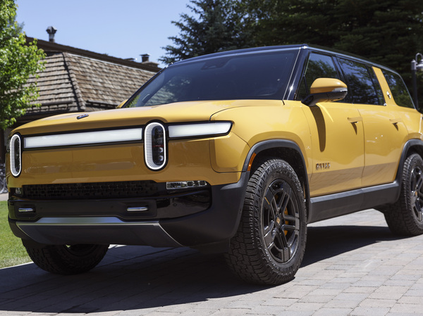 It's still unclear whether the Rivian R1S SUV, seen here, will qualify for a tax credit for electric cars after changes to the rules. Even if it does, a price cap may be a barrier for most purchasers: only a bare-bones version of the premium electric SUV squeaks under the $80,000 price cap.