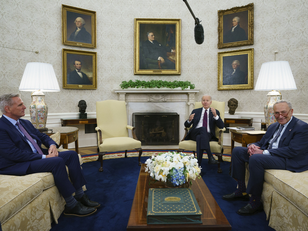 Speaker of the House Kevin McCarthy of Calif., left, and Senate Majority Leader Chuck Schumer of N.Y., right, listen as President Biden before an Oval Office meeting on the debt limit on May 9. Senate Minority Leader Mitch McConnell of Kentucky and House Minority Leader Hakeem Jeffries of New York also attended.