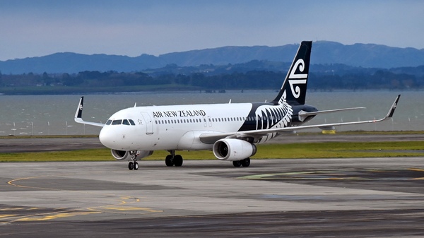 Air New Zealand is asking thousands of travelers to stand on scales before embarking, but it says no one will know what their weight is. An Air New Zealand plane is seen here at Auckland International Airport.