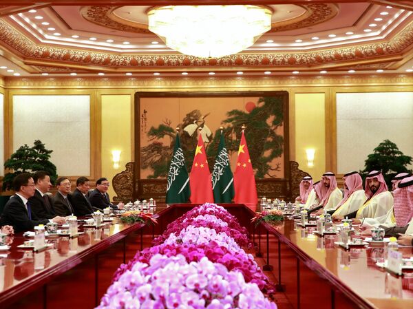 A delegation from China led by Chinese President Xi Jinping meet with their Saudi counterparts led by Saudi Crown Prince Mohammed bin Salman at the Great Hall of the People in Beijing on Feb. 22, 2019. Countries like Saudi Arabia and China are looking to chip away at the dollar's dominance.