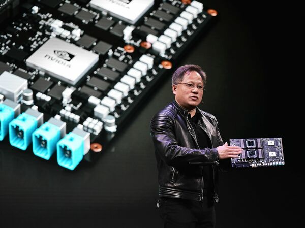The CEO of Nvidia, Jensen Huang, speaks during a news conference in Las Vegas on Jan. 7, 2018. The chipmaker has been one of the big winners of the AI stock rally seen in the first half of this year.