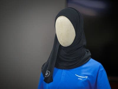 hijabs displayed on a mannequin