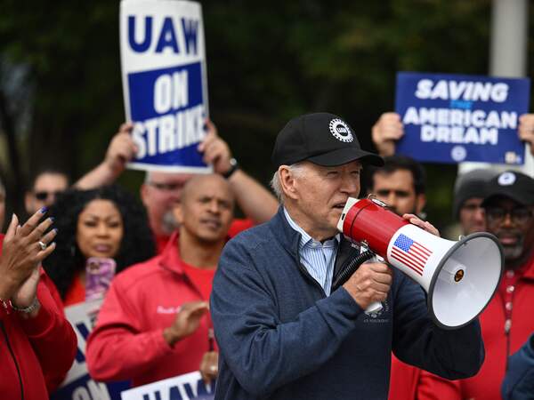 President Biden addresses striking UAW members at a picket line outside a General Motors Service Parts Operations plant in Belleville, Mich., on Sept. 26, 2023. Biden attended a picket line last month in an extraordinary show of support for striking workers.