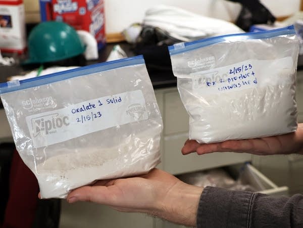 two plastic bags filled with white powder
