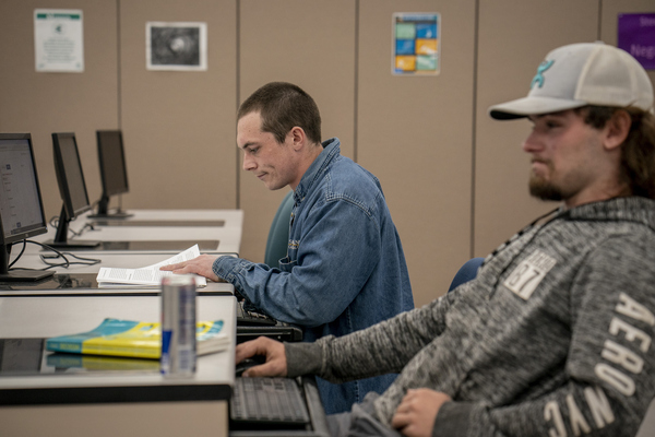 Dakota Swick, left, and Coleman Mongold attend a class in the turbine technician program.