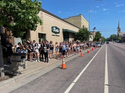 People crowd on a street
