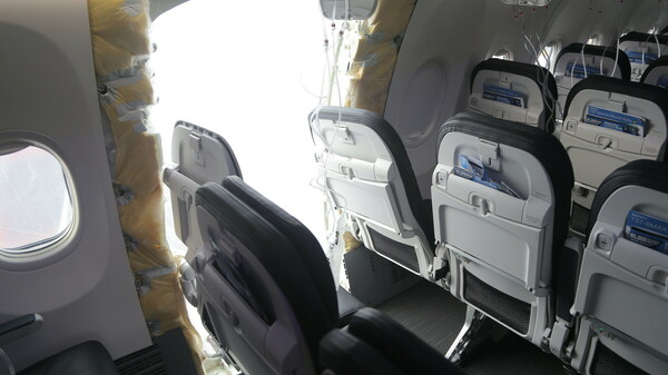 An image from the NTSB investigation shows the interior of Alaska Airlines Flight 1282 on a Boeing 737 Max 9, which suffered a violent explosion when the aircraft lost a door plug during a commercial flight.