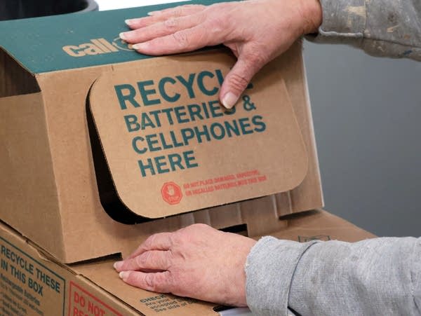 a cardboard box that says recycle batteries here