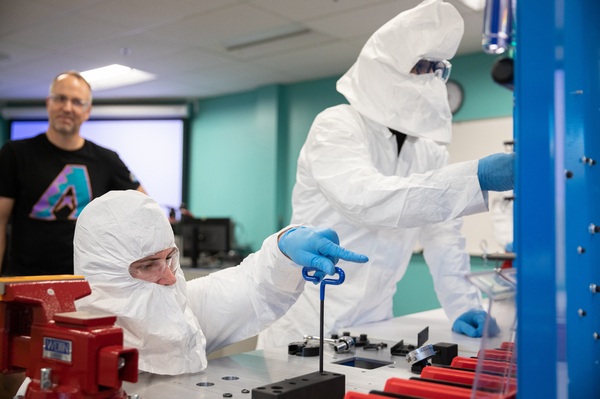 Brad Gist, 30, works with Liam Levinson, 28, during a lab for a 10-day semiconductor course at Chandler Gilbert Community College in Mesa, Ariz., on Oct. 11, 2023.