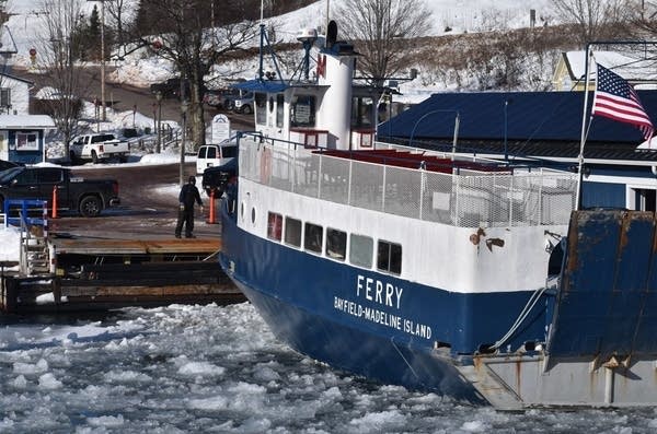 a white and blue ferry