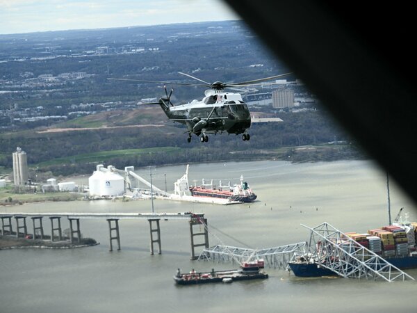 Marine One with President Biden onboard makes an aerial tour of the collapsed Francis Scott Key Bridge in Baltimore on April 5.