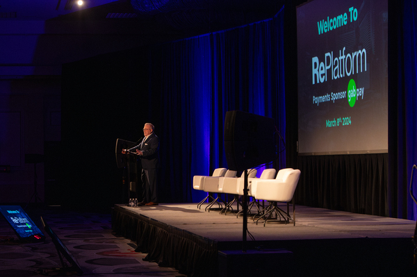 Chris Widener, founder of the Red Referral Network, speaks at the RePlatform conference.