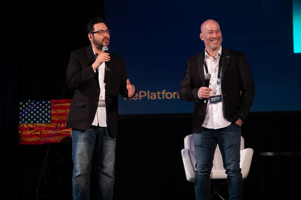 Dan Eddy (left), the chief operating officer of alternative payment processor GabPay, and Lonnie Passoff, who runs a payment processing company that works with the social media platform Gab, speak at the RePlatform conference in Las Vegas last month.